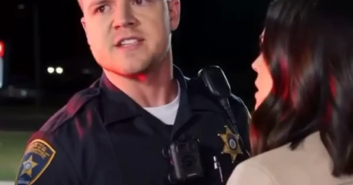 The Officer Who Said She Could Leave Only When He Allowed It. The Stranger in the Charcoal Jacket Knew the Real Reason She Had Been Stopped
