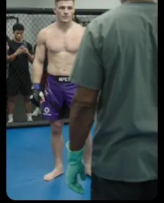A Rich Kid Challenged the Quiet Janitor to Spar — Then the Janitor Took Off His Work Shirt and Stepped Into the Cage
