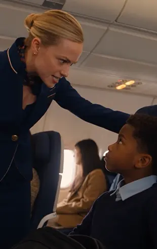 The Flight Attendant Ordered Eleven-Year-Old Malik Johnson Out of First Class Until His Father Walked Aboard and Asked One Quiet Question.