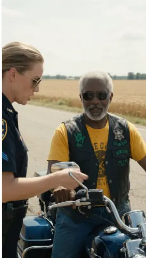 Cops Stopped an Elderly Man on a Motorcycle — Then A Military Convoy Arrived Minutes Later