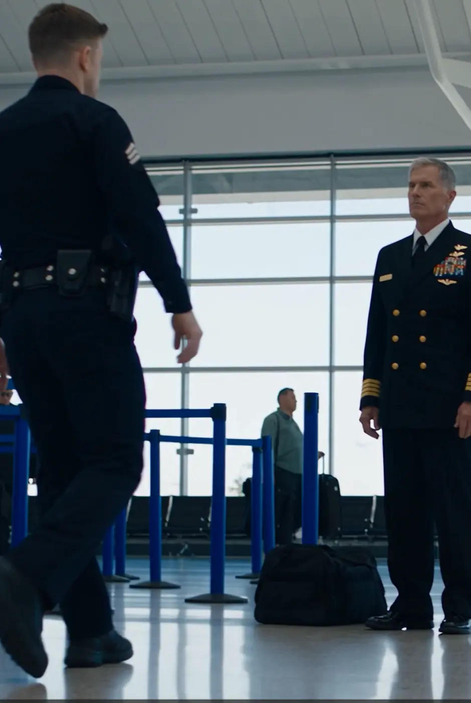 THEY HANDCUFFED A NAVY CAPTAIN AT THE AIRPORT FOR WEARING HIS OWN UNIFORM—THEN ONE RADIO CALL MADE EVERY OFFICER STOP MOVING