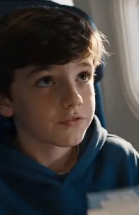 She aggressively dragged a quiet 10-year-old out of his first-class seat—until he made one phone call that ended her billionaire husband’s career.