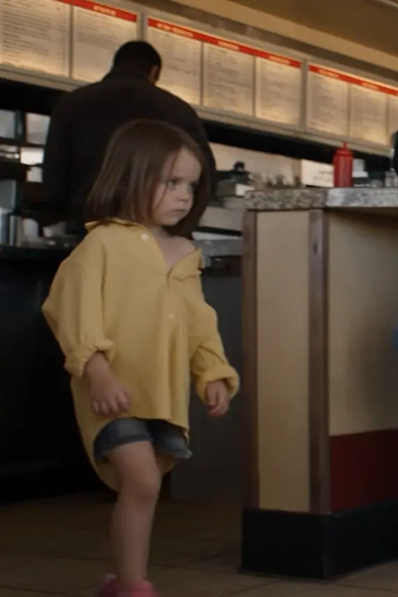 The first thing I noticed was not the little girl’s mismatched shoes.