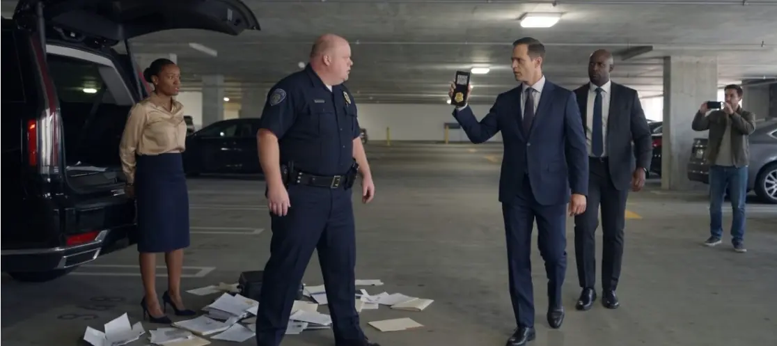 A Police Officer Cuffed a Woman Beside Her SUV in a Parking Garage—Then Two Agents Walked In and Everything Changed